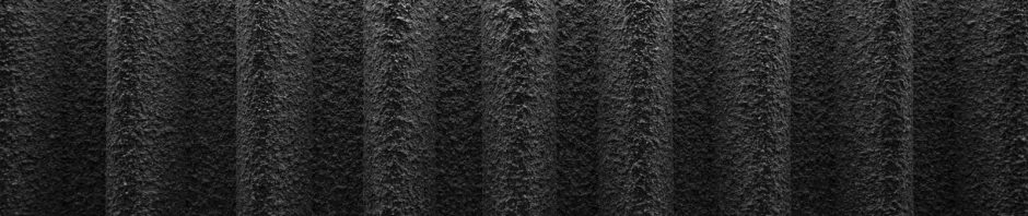 Close-up of a dusty pleated air filter